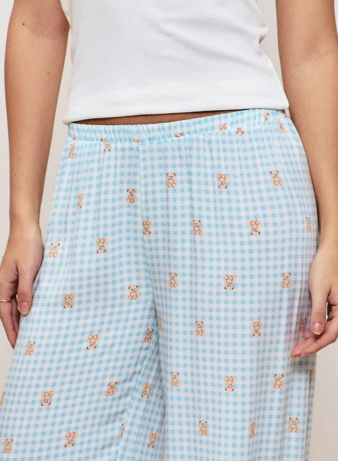 UNDIZ Check trousers with teddy bear pattern